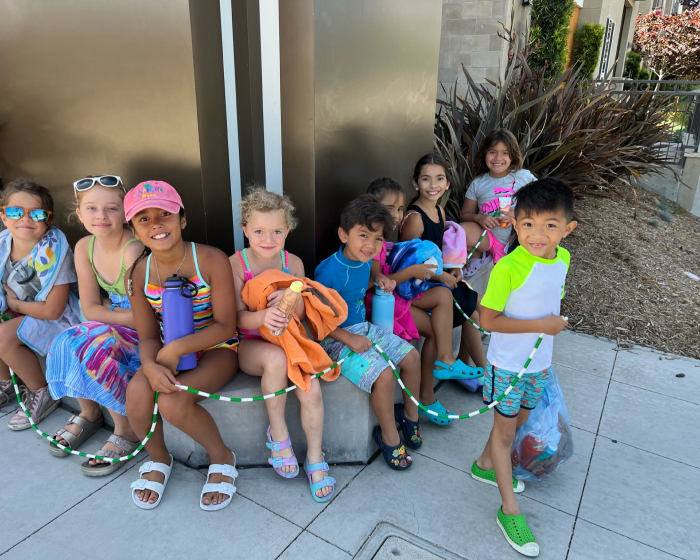 A group of kids posing together during camp