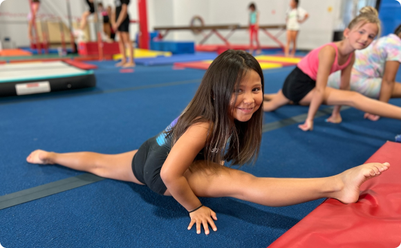 A girl doing the splits