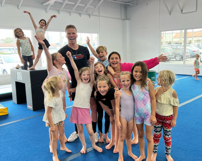 Kids with their instructuor cheering