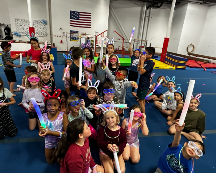 A group of kids wearing bunny ears during Kids Night Out.